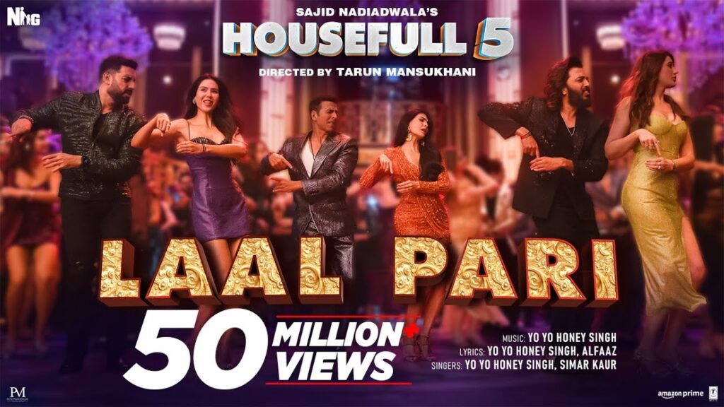 Cast of the song 'Laal Pari' dancing in a party scene with 'Laal Pari 50 Million Views' text overlay.